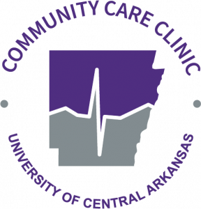 Circular logo for the Community Care Clinic at the University of Central Arkansas. The design features a purple outline of the state of Arkansas with a white heartbeat line running across gray mountains inside the state shape. Surrounding the graphic is the text “Community Care Clinic” at the top and “University of Central Arkansas” at the bottom, with small gray dots on each side.