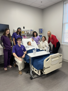Group Picture of 25-26 DNT Cohort in Sim Lab