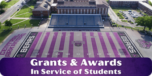 Button showing the football field. Leads to awards and grants in service of students.