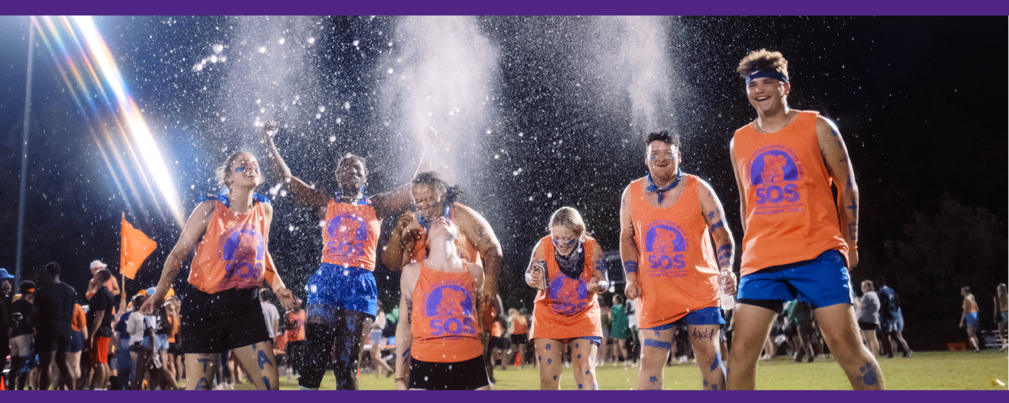 Members of the Student Orientation Staff enjoying Battle of the Halls during Welcome Week